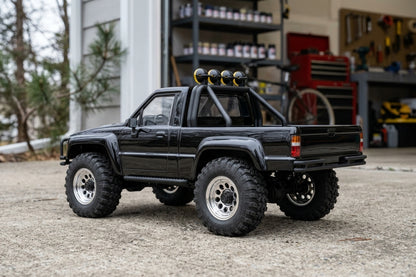 Venture18 Flux 1985 Toyota Hilux SR5 - Black (T)