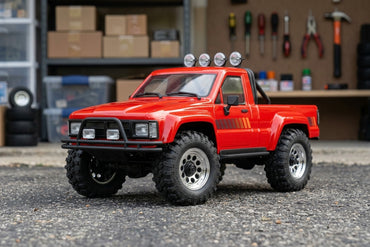 Venture18 Flux 1985 Toyota Hilux SR5 - Red (T)